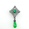 1920's Silver Rhinestone Brooch with Green Gemstones